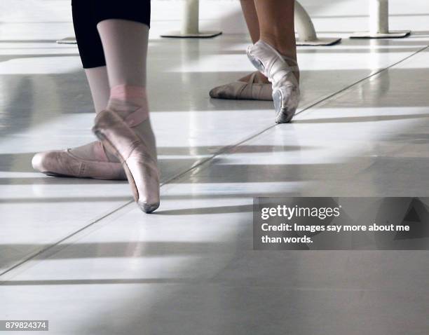 feet of two ballerinas rehearsing. detail. close up. - ballet feet hurt stock pictures, royalty-free photos & images