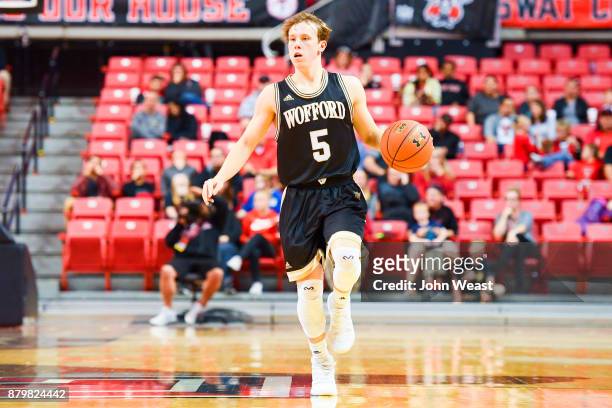 Storm Murphy of the Wofford Terriers brings the ball up court during the game against the Texas Tech Red Raiders on November 22, 2017 at United...