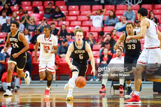 Storm Murphy of the Wofford Terriers pushes the ball up court during the game against the Texas Tech Red Raiders on November 22, 2017 at United...