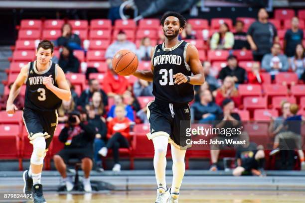 Donovan Theme-Love of the Wofford Terriers brings the ball up court during the game against the Texas Tech Red Raiders on November 22, 2017 at United...