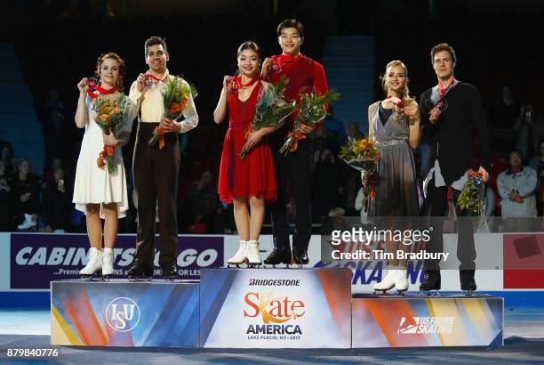 Silver medalists Anna Cappellini and Luca Lanotte of Italy, gold medalists Maia Shibutani and Alex Shibutani of the United States, and bronze...