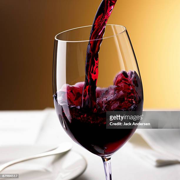 wine pouring into glass - red wine bildbanksfoton och bilder