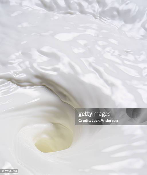 swirling milk - milk swirl stock pictures, royalty-free photos & images