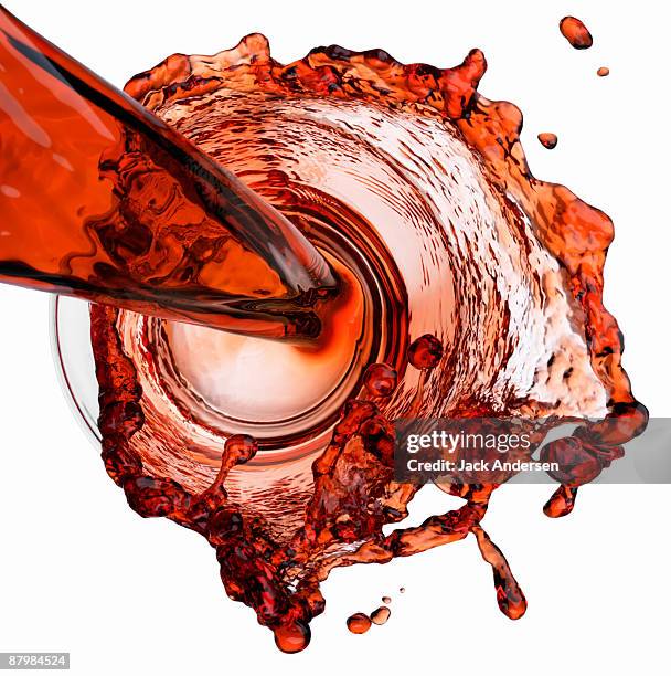 red wine pour - wine splashing stock pictures, royalty-free photos & images