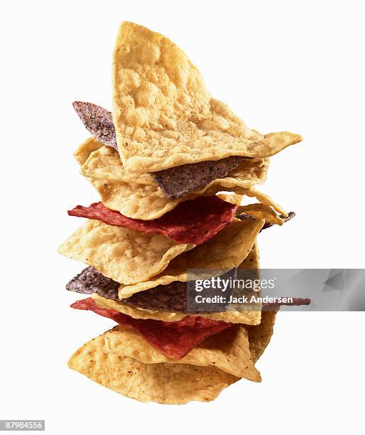 stacked tortilla chips - tortilla chip stock pictures, royalty-free photos & images