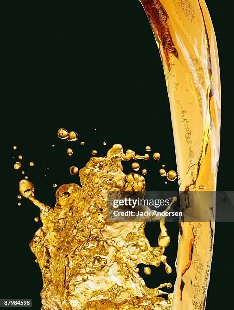 beer pour - beer splashing stock pictures, royalty-free photos & images