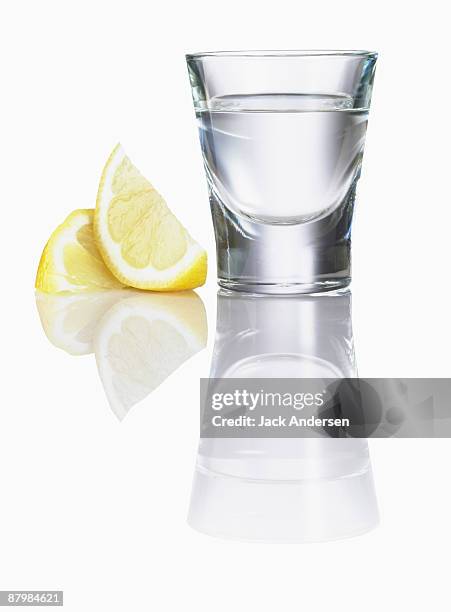 tequila shot - shot glass stock-fotos und bilder