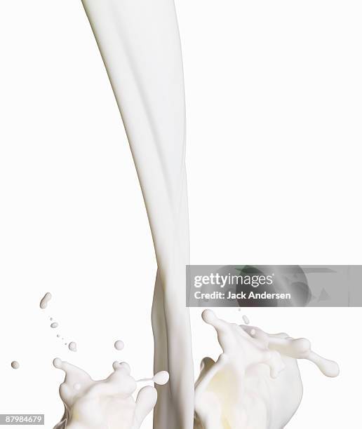 pouring milk - dump stockfoto's en -beelden