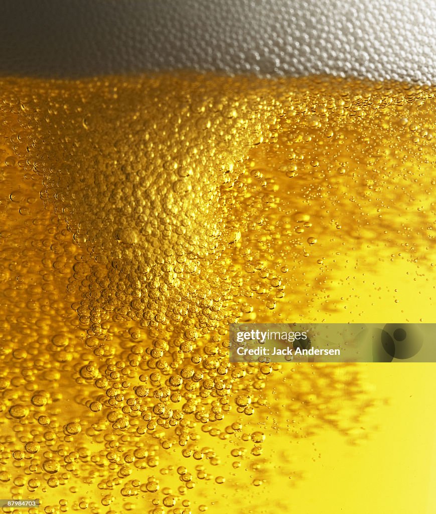 Beer with bubbles and foam