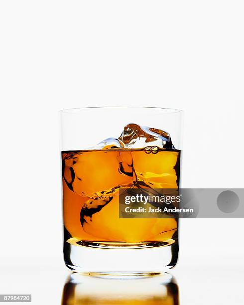 scotch on the rocks - glass ice stock pictures, royalty-free photos & images