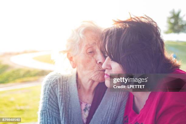 elderly mother - palliative care stock pictures, royalty-free photos & images