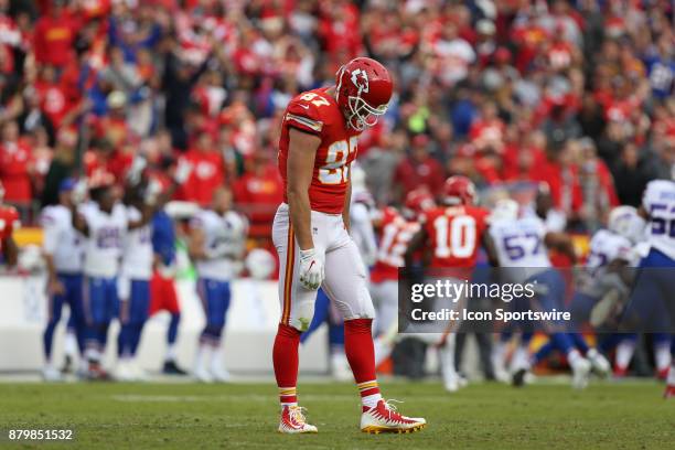 Kansas City Chiefs tight end Travis Kelce hangs his head in dejection after Buffalo Bills cornerback Tre'Davious White intercepted a pass late in the...