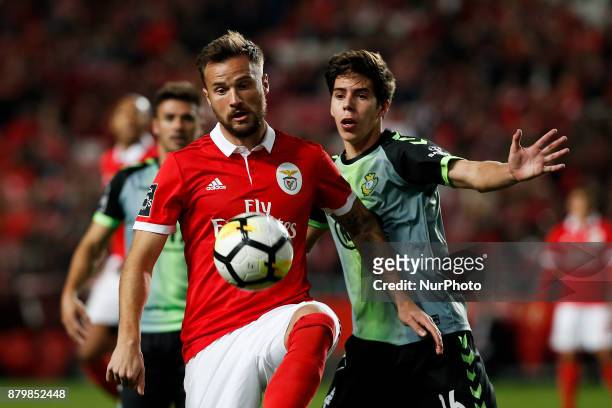Benfica's forward Haris Seferovic vies for the ball with Setubal's midfielder Andre Sousa during Primeira Liga 2017/18 match between SL Benfica vs...