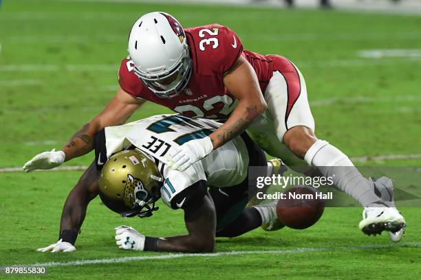 Marqise Lee of the Jacksonville Jaguars is tackled by Tyrann Mathieu of the Arizona Cardinals in the second half at University of Phoenix Stadium on...