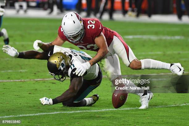 Marqise Lee of the Jacksonville Jaguars is tackled by Tyrann Mathieu of the Arizona Cardinals in the second half at University of Phoenix Stadium on...