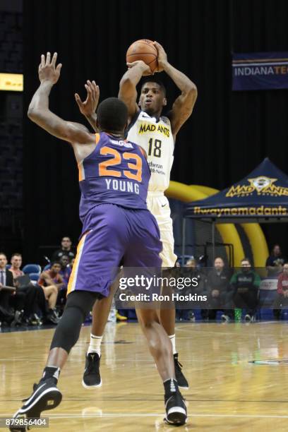 DeQuan Moore of the Fort Wayne Mad Ants shoots over Mike Young of the Northern Arizona Suns during their NBDL game at Memorial Coliseum on November...