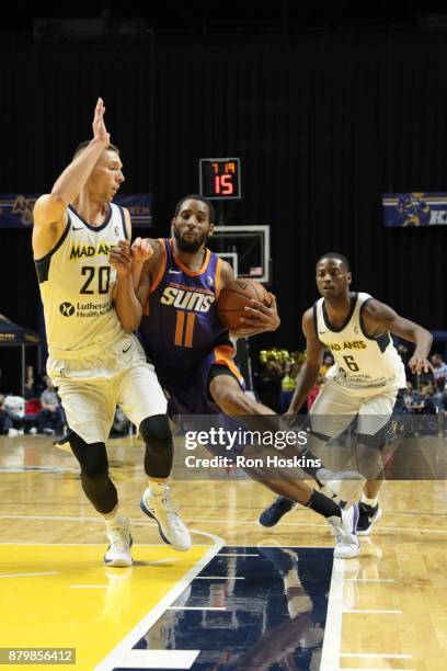 Jarrod Uthoff of the Fort Wayne Mad Ants battles Rahlir Hollis-Jefferson of the Northern Arizona Sunns during their NBDL game at Memorial Coliseum on...