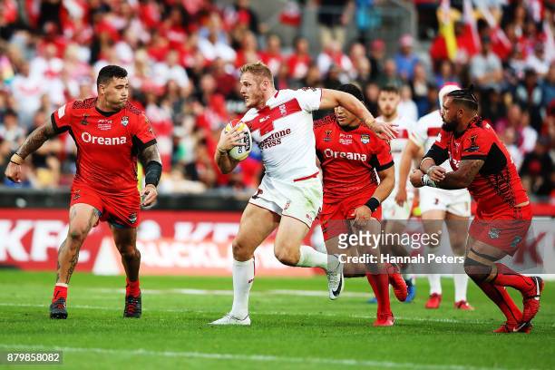 Tom Burgess of England charges forward during the 2017 Rugby League World Cup Semi Final match between Tonga and England at Mt Smart Stadium on...