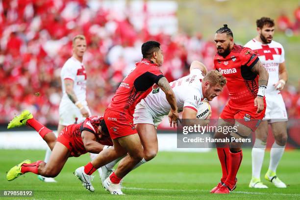 Tom Burgess of England charges forward during the 2017 Rugby League World Cup Semi Final match between Tonga and England at Mt Smart Stadium on...