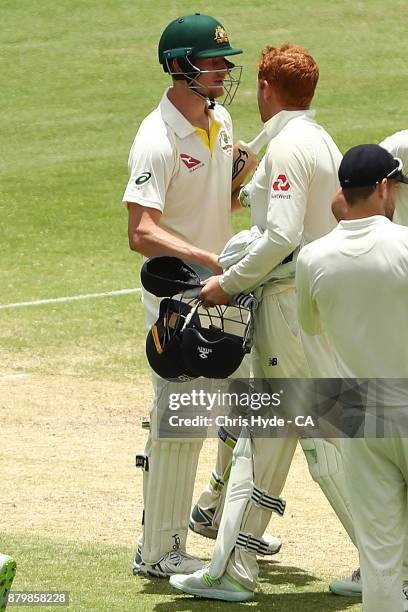 Cameron Bancroft of Australia and Jonny Bairstow of England shake hand after Australia won on day five of the First Test Match of the 2017/18 Ashes...