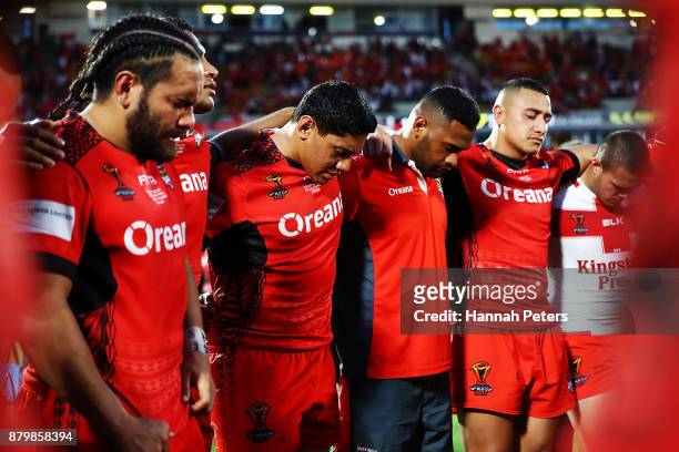 Jason Taumalolo of Tonga prays with the team after losing the 2017 Rugby League World Cup Semi Final match between Tonga and England at Mt Smart...