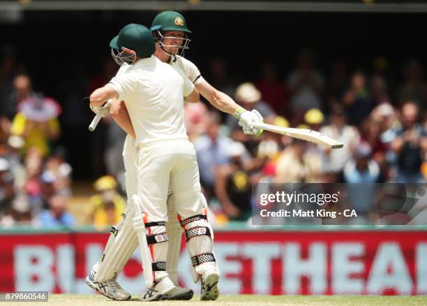 Cameron Bancroft and David Warner of Australia celebrate victory during day five of the First Test Match of the 2017/18 Ashes Series between...