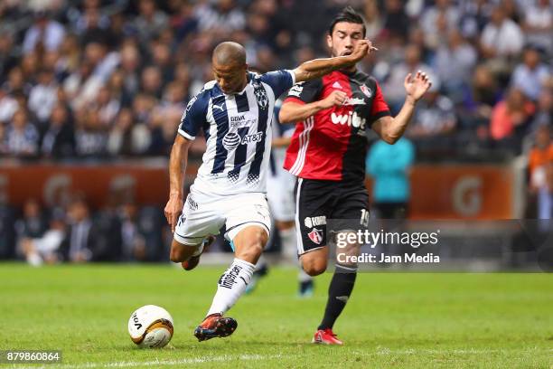 Carlos Sanchez of Monterrey fights for the ball with Juan Pablo Vigon of Atlas during the quarter finals second leg match between Monterrey and Atlas...