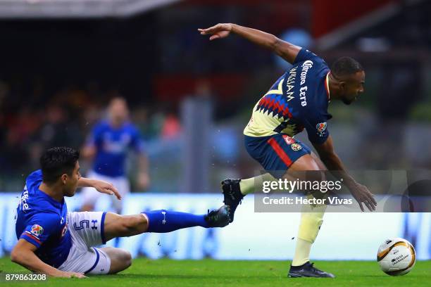Francisco Silva of Cruz Azul struggles for the ball with William Da Silva of America during the quarter finals second leg match between America and...