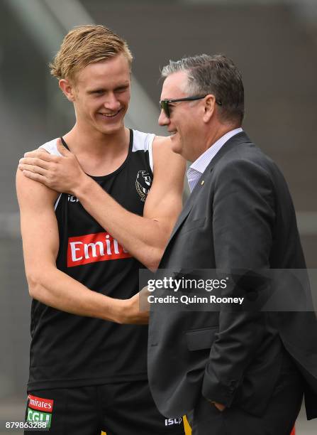 Jaidyn Stephenson of the Magpies meets Eddie McGuire the president of the Magpies during a Collingwood Magpies AFL training session at Holden Centre...