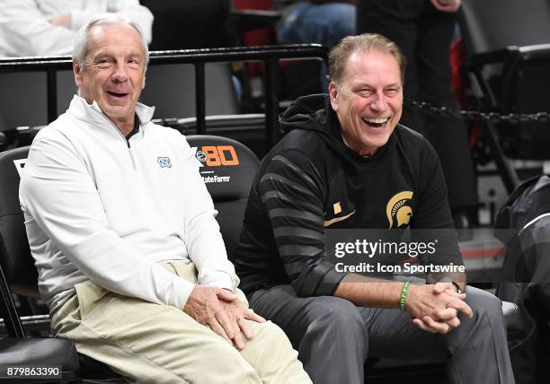 North Carolina Head Coach Roy Williams and Michigan State Head Coach Tom Izzo have a chat before the game in the championship game of the Victory...