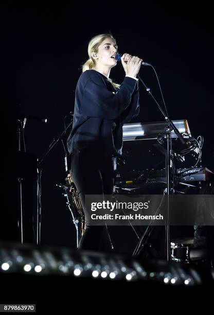 Singer Hannah Reid of the British band London Grammar performs live on stage during a concert at the Velodrom on November 26, 2017 in Berlin, Germany.