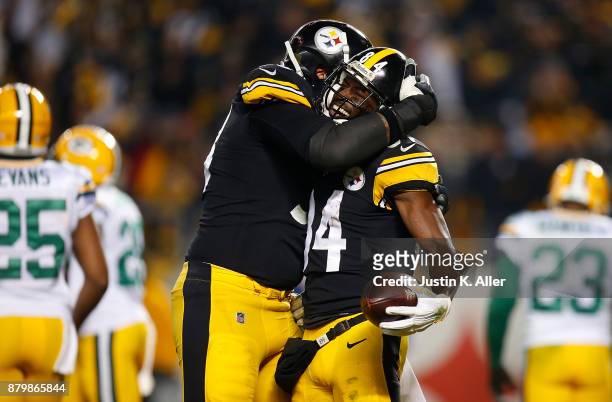 Antonio Brown of the Pittsburgh Steelers celebrates with Maurkice Pouncey after a catch for a two point conversion in the second quarter during the...
