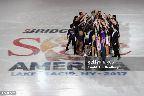 Skaters perform in the Smucker's Skating Spectacular during day three of 2017 Bridgestone Skate America at Herb Brooks Arena on November 26, 2017 in...