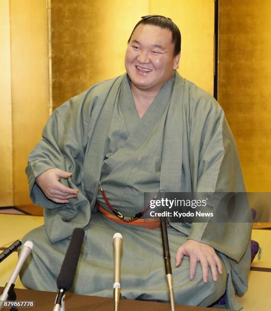 Sumo grand champion Hakuho speaks during a press conference in Fukuoka on Nov. 27 a day after the final day of the Kyushu Grand Sumo Tournament,...