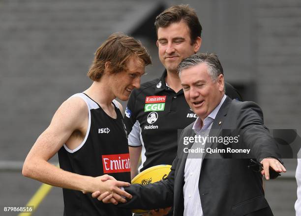 Nathan Murphy of the Magpies meets Eddie McGuire the president of the Magpies during a Collingwood Magpies AFL training session at Holden Centre on...