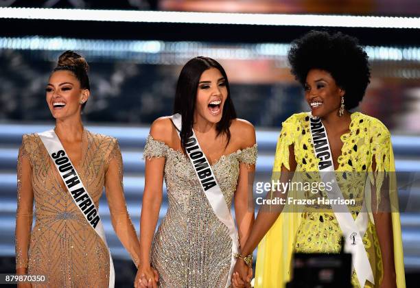 Top 3 finalists Miss South Africa 2017 Demi-Leigh Nel-Peters, Miss Colombia 2017 Laura Gonzalez, and Miss Jamaica 2017 Davina Bennett compete during...