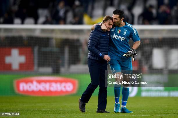 Gianluigi Buffon of Juventus FC hugs Davide Nicola of FC Crotone at the end of the Serie A football match between Juventus FC and FC Crotone....