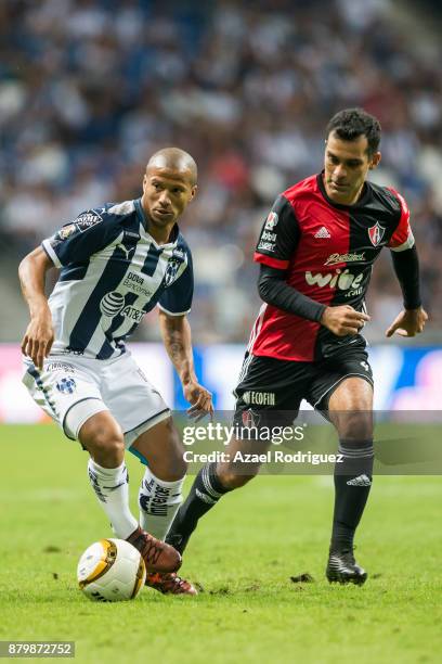 Carlos Sanchez of Monterrey fights for the ball with Rafael Marquez of Atlas during the quarter finals second leg match between Tigres UANL and Leon...