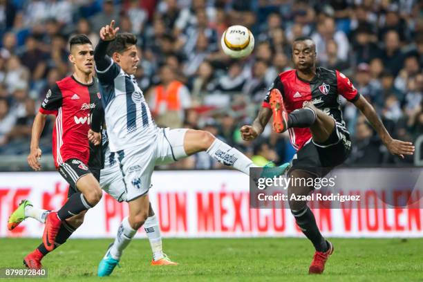 Jonathan Gonzalez of Monterrey fights for the ball with Jaine Barreiro of Atlas during the quarter finals second leg match between Tigres UANL and...