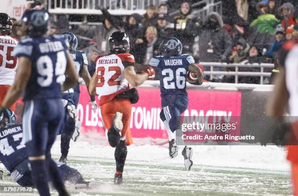 Cassius Vaughn of the Toronto Argonauts runs the ball the length of the field for the game winning touchdown after picking up a fumble against the...