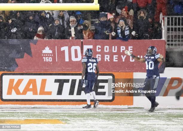 Cassius Vaughn of the Toronto Argonauts celebrates his game-winning touchdown after running the ball the length of the field against the Calgary...
