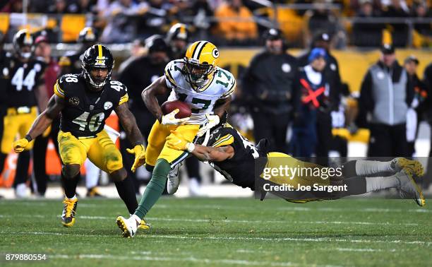 Davante Adams of the Green Bay Packers runs upfield after a catch in the fourth quarter during the game against the Pittsburgh Steelers at Heinz...