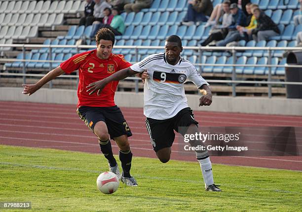 Richard Sukuta-Pasu of Germany battles for the ball with Mario Gaspar during the U19 Euro Qualifier match between Spain and Germany at the A Le Coq...