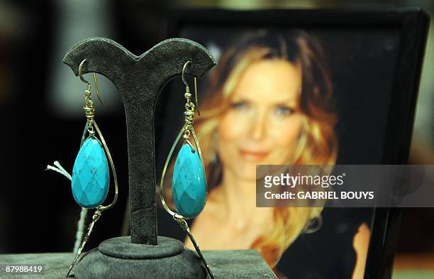View of Michelle Pfeiffer's Robyn Rhodes turquoise drop earrings, during the media day of "Stars for a cause", a charity auction in Hollywood,...