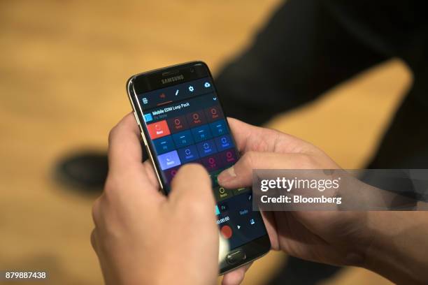 Kuok Meng Ru, founder of Bandlab Technologies Ltd., demonstrates the Looper feature on the Bandlab mobile app during an interview in Singapore, on...