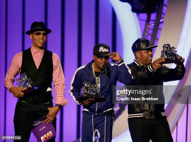 Ronnie DeVoe, Ricky Bell, and Michael Bivins of Bell Biv DeVoe accept the Soul Train Certified Award onstage at the 2017 Soul Train Awards, presented...