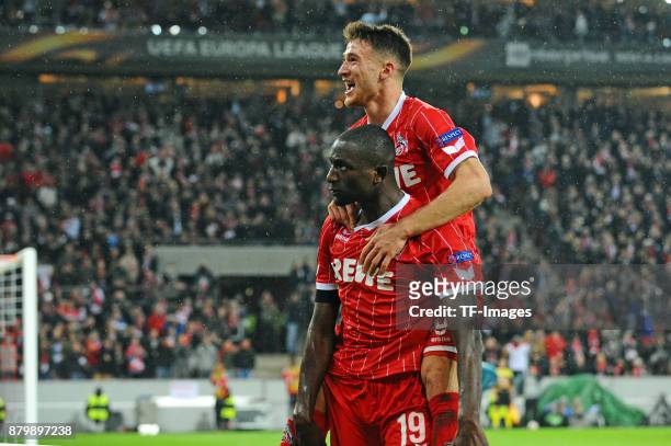 Sehrou Guirassy of Cologne celebrates after scoring his team`s first goal with Salih Oezcan of Cologne during the UEFA Europa League Group H soccer...