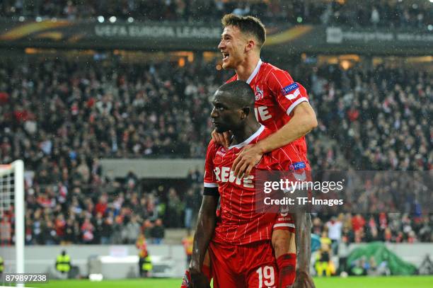 Sehrou Guirassy of Cologne celebrates after scoring his team`s first goal with Salih Oezcan of Cologne during the UEFA Europa League Group H soccer...