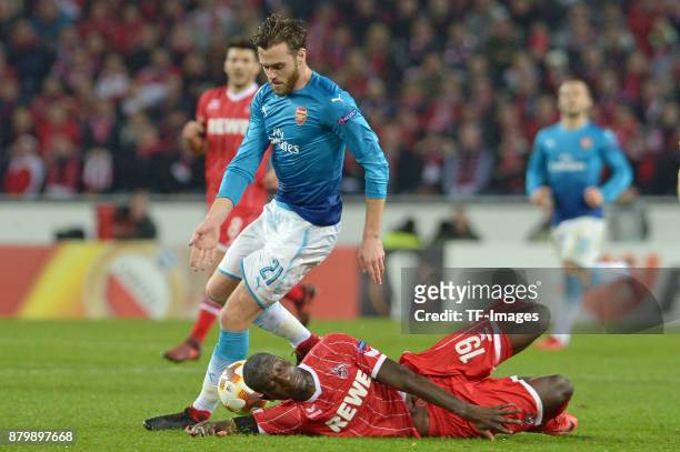 Calum Chambers of Arsenal and Sehrou Guirassy of Cologne battle for the ball during the UEFA Europa League Group H soccer match between 1.FC Cologne...