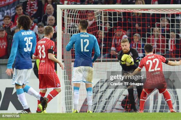 Goalkeeper Timo Horn of Cologne catches the ball during the UEFA Europa League Group H soccer match between 1.FC Cologne and Arsenal FC at the...